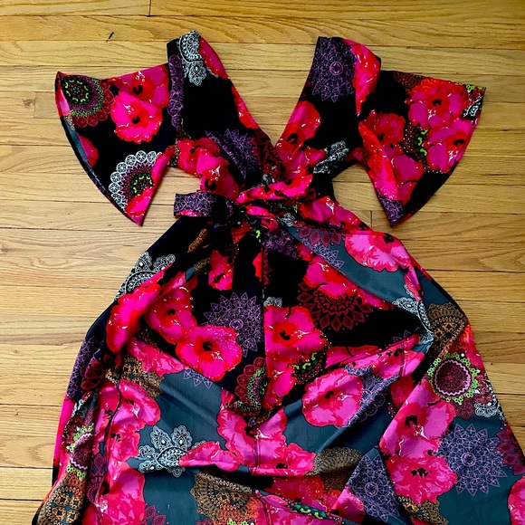 Floral hi-low Romper with tie belt and skirt. - Picture 7 of 12